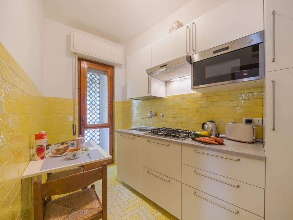 Kitchen, Kitchen Appliance, Countertop, Flooring, Interior Design, Major Appliance, Wood, Floor, Cabinetry, Room