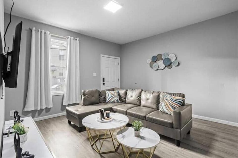 Living room with comfortable seating to enjoy TV