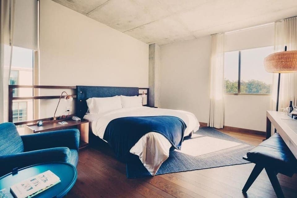 Soak up morning light from bed in a quiet retreat.