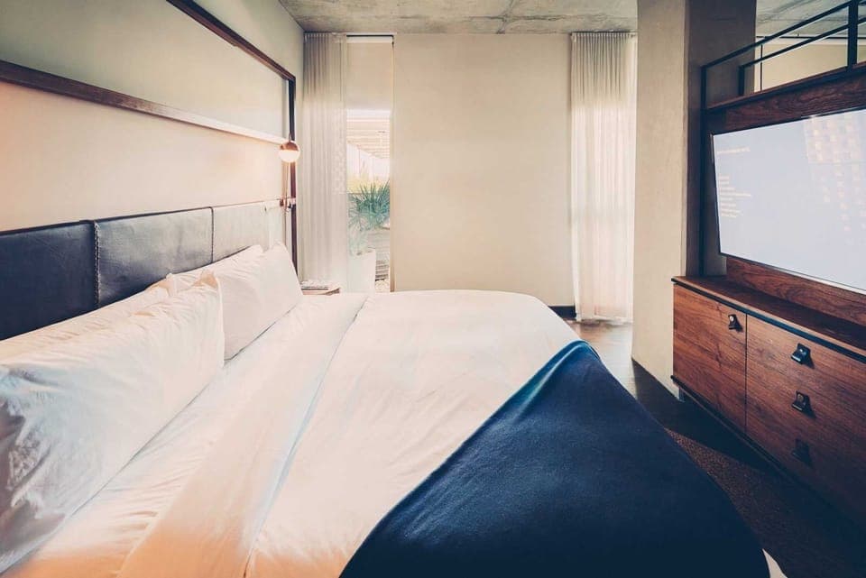 Sink into crisp linens and wake to soft daylight.