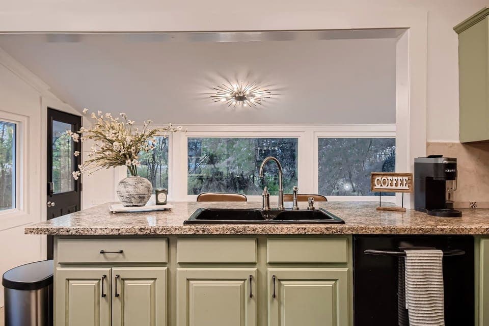 Kitchen overlooking backyard views