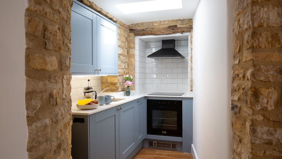 The galley kitchen has space to cook up a storm