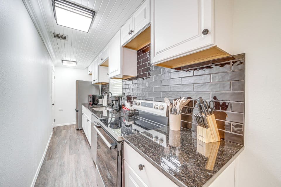 Kitchen | Main Floor | Dishwasher | Single-Serve Coffee Maker | Dishwasher