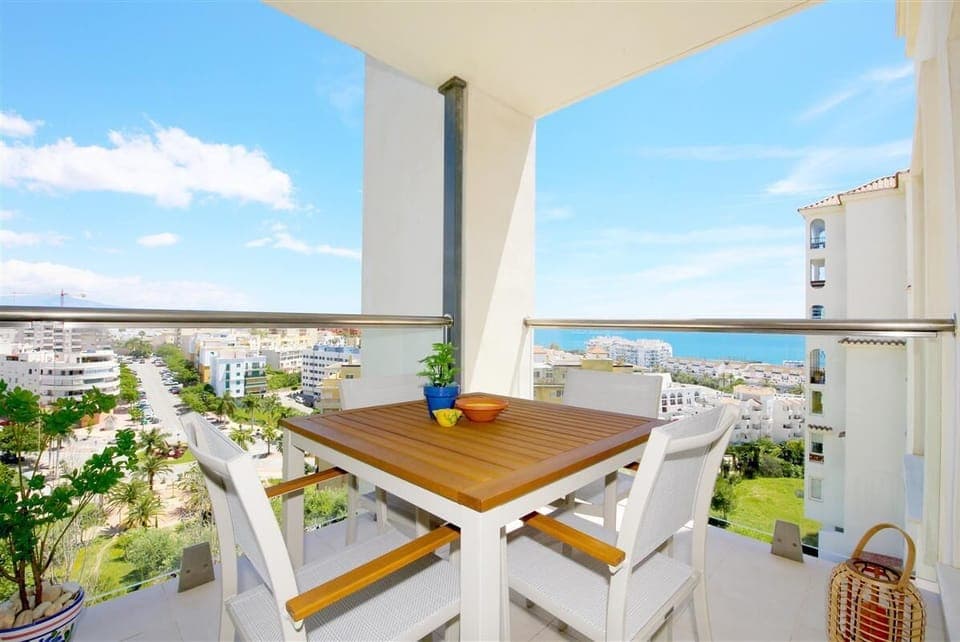 Beautiful terrace with outdoor dining area for four guests and sea views
