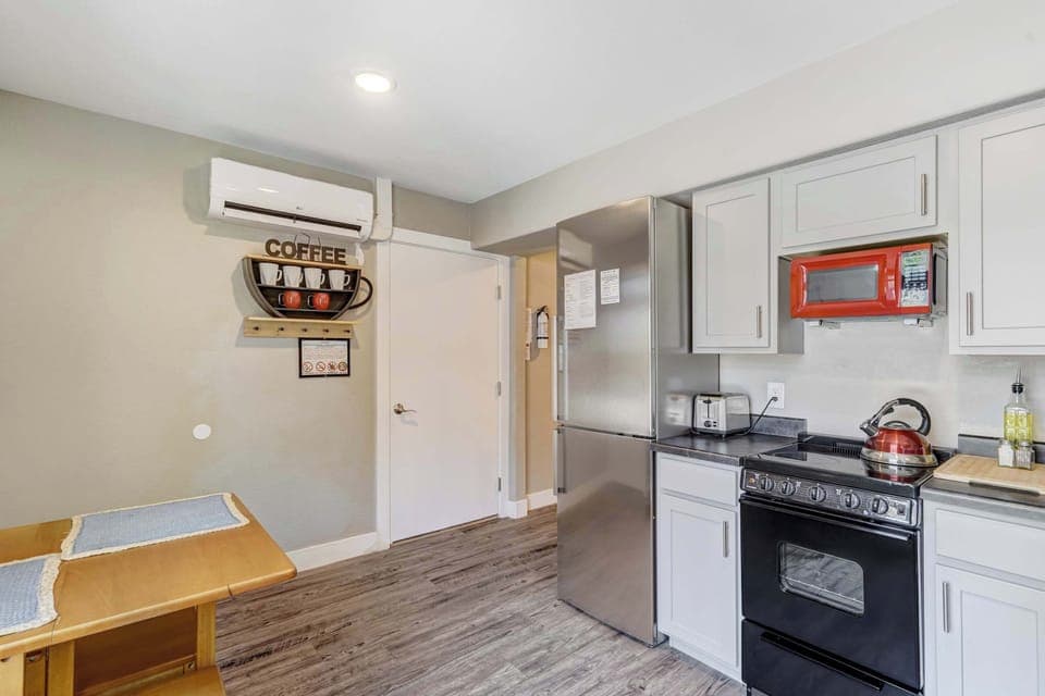 The kitchen is fully equipped with essentials, cookware, and a few thoughtful extras to make dining in easy and enjoyable.


