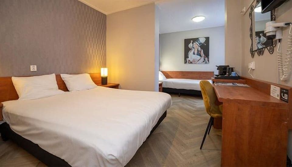 Unit with two Twin bed and a sofa bed