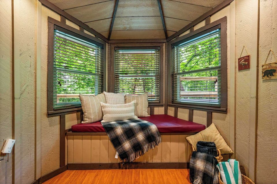 The ideal spot to curl up with a book or just relax and soak in the cabin vibes.