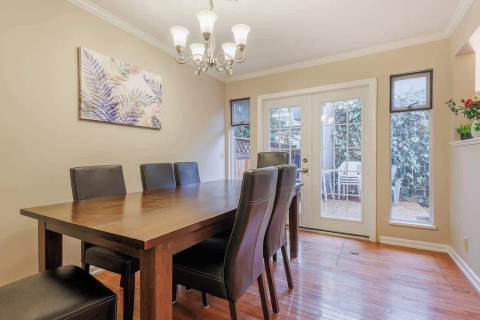 Gather for meals at this elegant dining table with seating for eight, ideal for family dinners.
