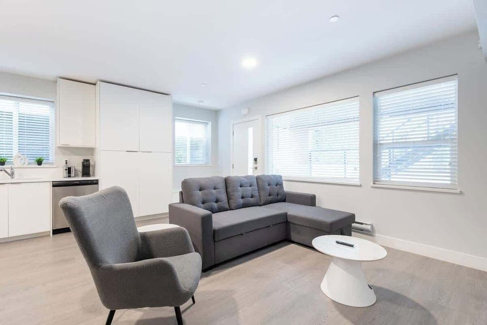 Spacious and modern living room – the perfect spot to unwind after a day at the beach.