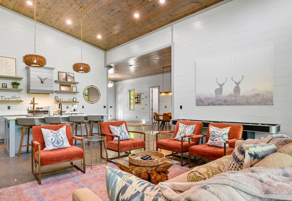 Spend quality time with loved ones in this open-concept living area, featuring plush seating, elegant décor, and a state-of-the-art entertainment system.