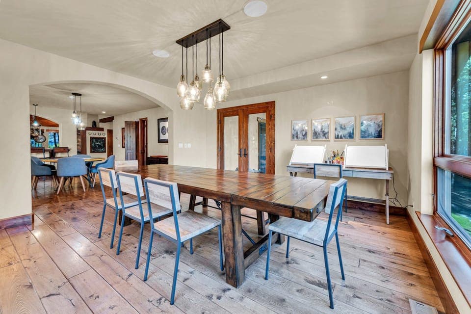 Dining area: Main floor, seating for 12, connects to kitchen and outdoor deck