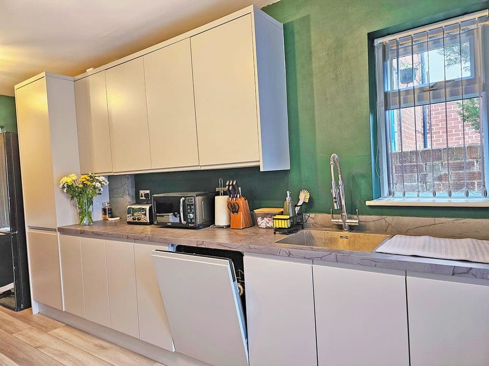 Kitchen, dishwasher, fridge, microwave, toaster