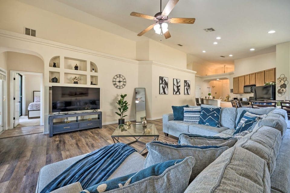 Relax in a spacious living room with plush seating and a smart TV for all your entertainment needs.