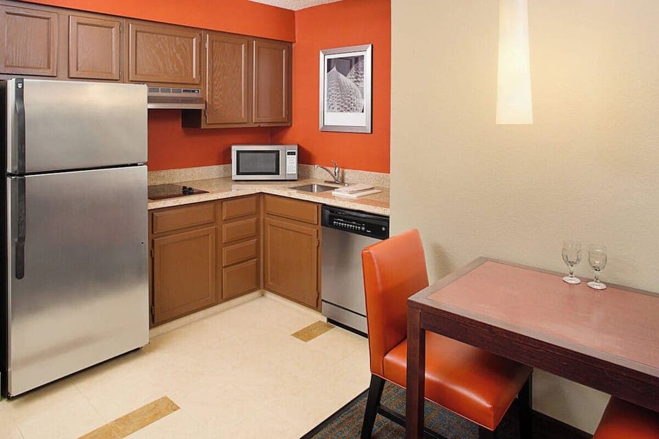 Cook and snack easily with fridge, microwave, and kitchenette space.