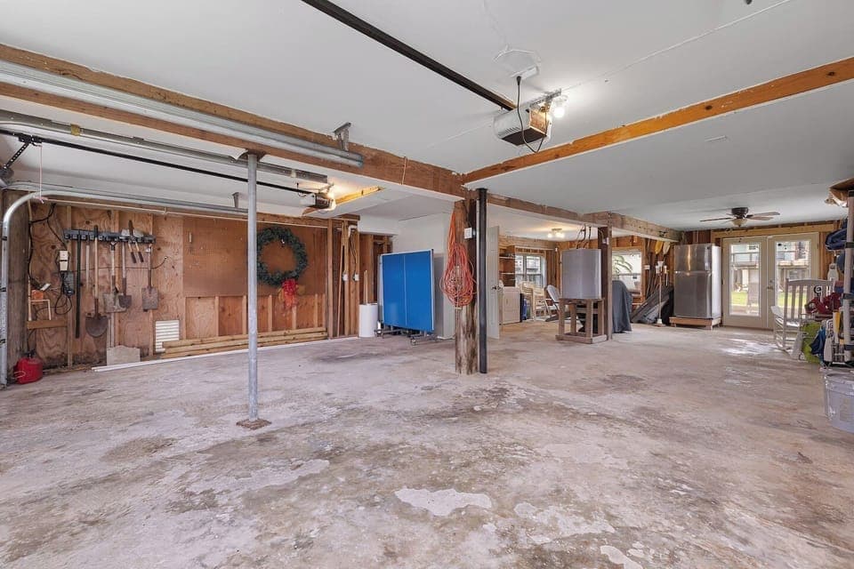 parking available on the left - no tall trucks due to garage door mechanism. Ping pong table on the right not showing. Pictures to come!