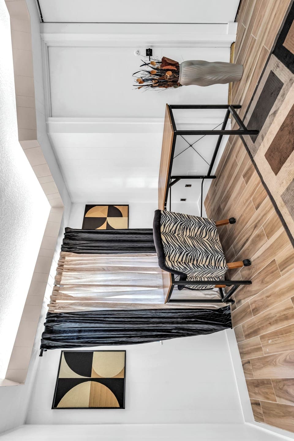 Dedicated desk with zebra-print chair—ideal for remote work or journaling.