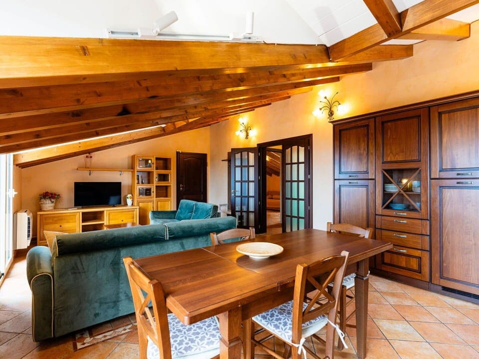 Furniture, Interior Design, Flooring, Floor, Wood, Ceiling, Room, Light Fixture, Table, Lighting