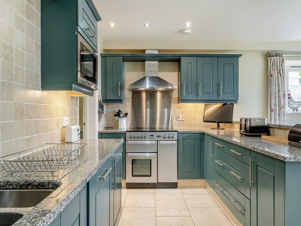 Kitchen/diner | Coach House - Doxford Cottages, Doxford, near Embleton