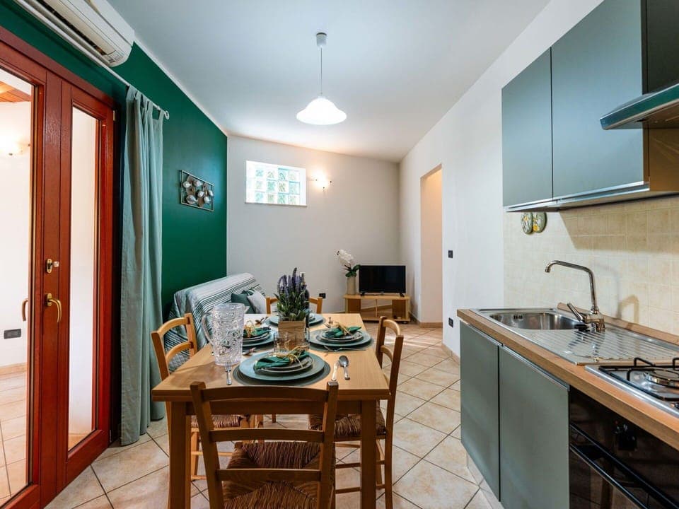 Flooring, Interior Design, Floor, Room, Ceiling, Apartment, Kitchen, Wood Stain, Home Appliance, Countertop