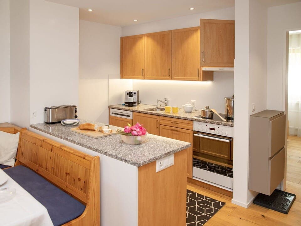 Furniture, Kitchen, Interior Design, Wood, Flooring, Floor, Major Appliance, Kitchen Appliance, Cabinetry, Room