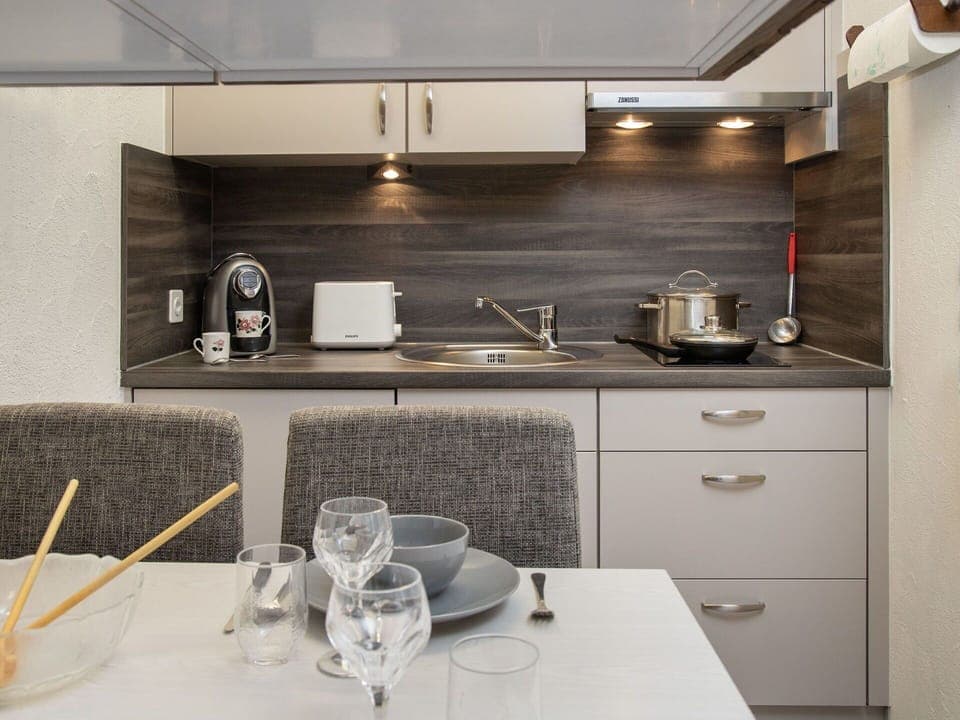 Countertop, Kitchen, Sink, Plumbing Fixture, Interior Design, Tap, Flooring, Cabinetry, Furniture, Kitchen Appliance