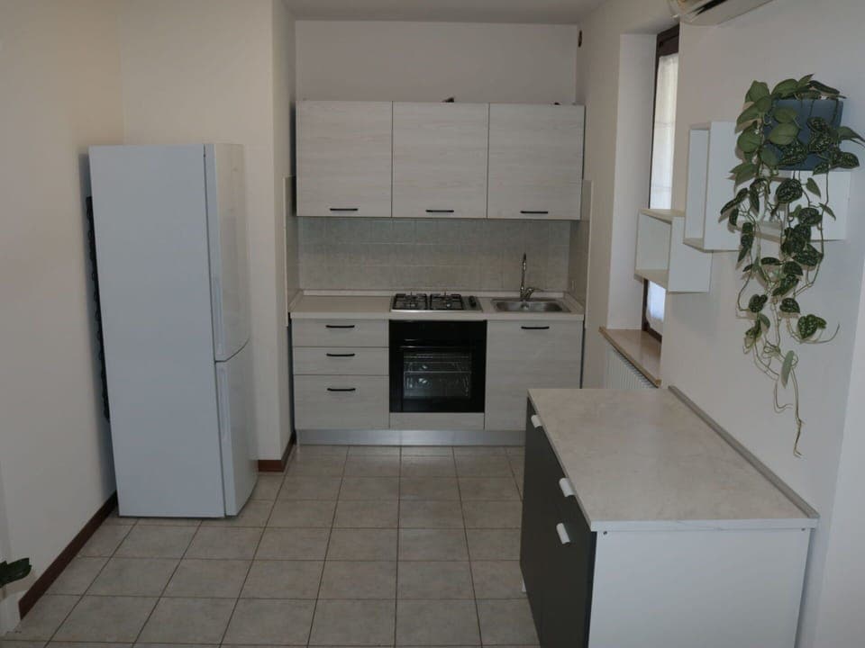 Kitchen, Kitchen Appliance, Countertop, Flooring, Major Appliance, Cabinetry, Wood, Furniture, Floor, Interior Design