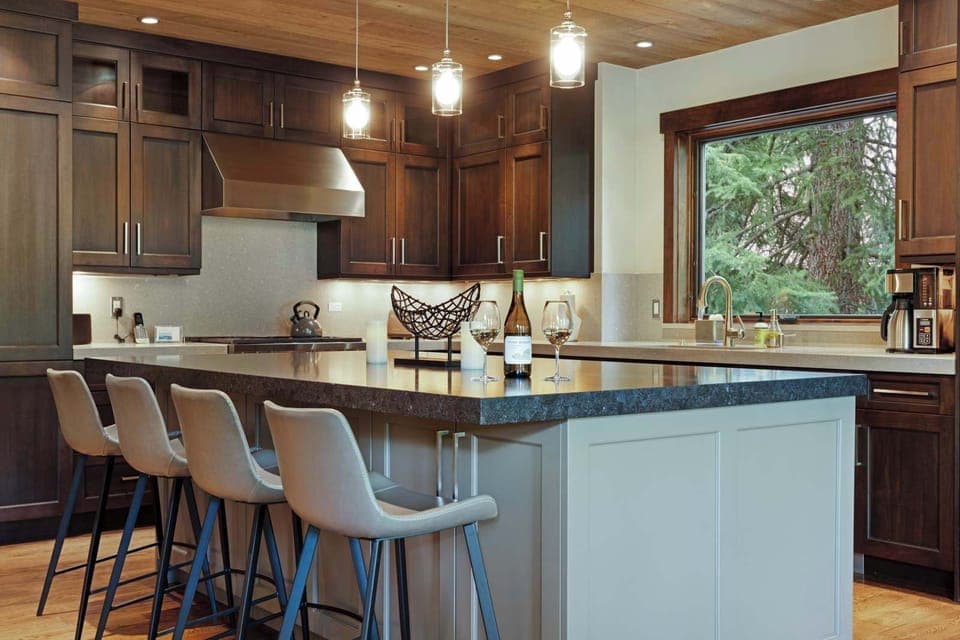 The chic, open kitchen offers ample space & every home comfort