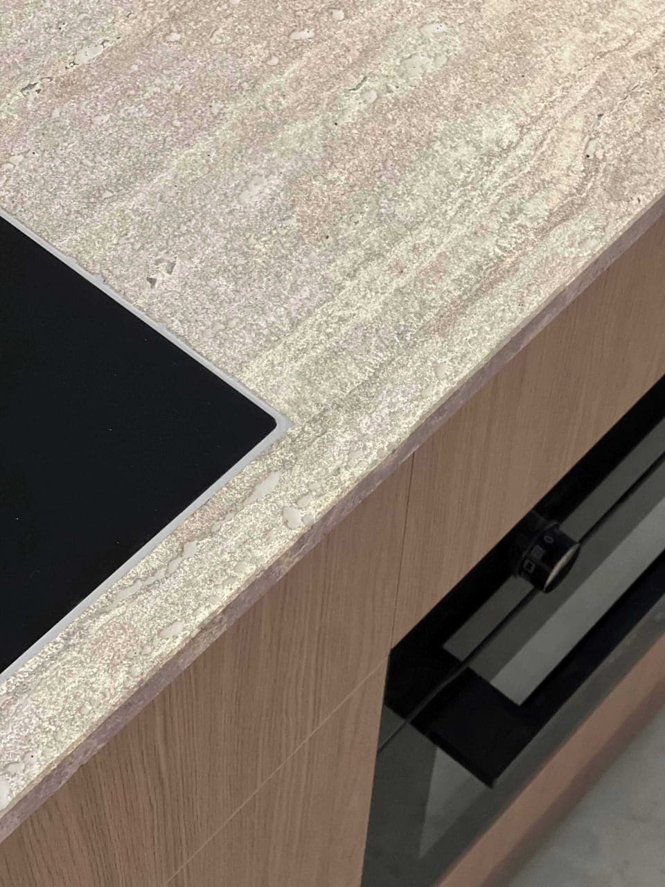 Modern kitchen detail with stone countertop