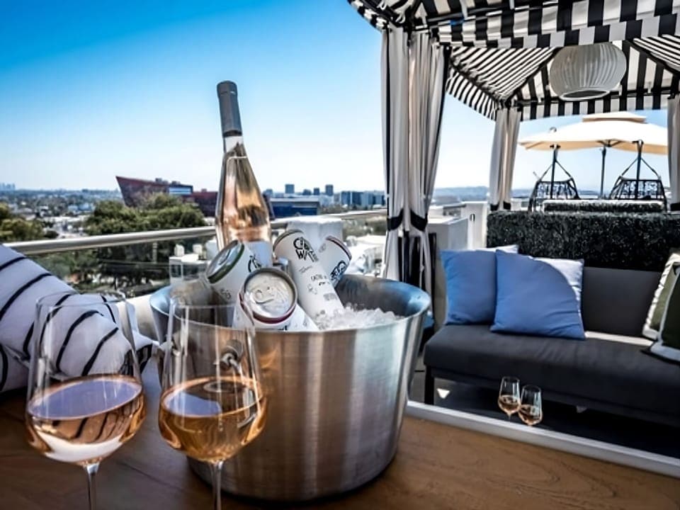 Sip sunset champagne in a cabana with sweeping skyline views
