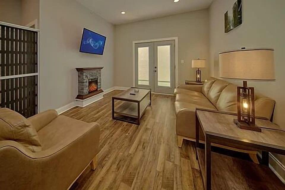 Spacious Living Room with Electric Fireplace and SMART TV with Cable & WIFI throughout vacation rental