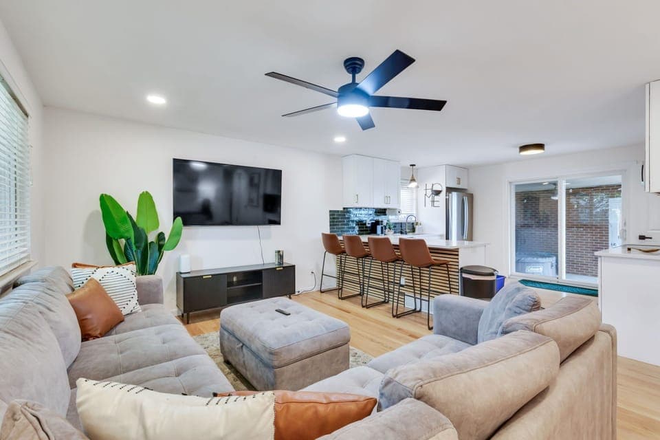 Open floor concept area featuring the living room and kitchen