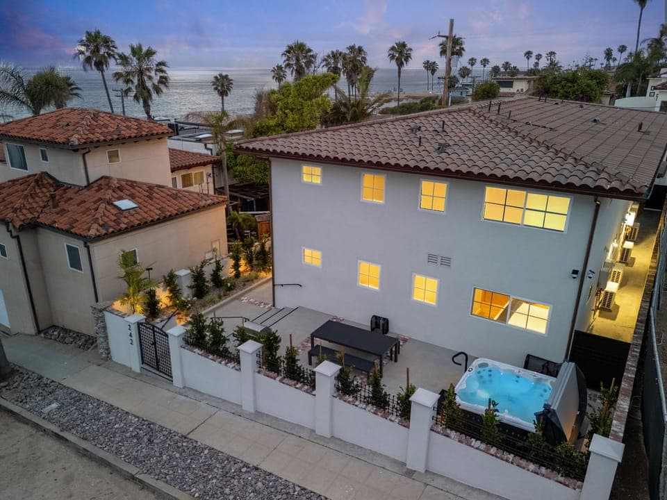 This La Jolla gem at Rosemont Street features a clean, modern façade accented by lush landscaping and coastal-inspired architecture.