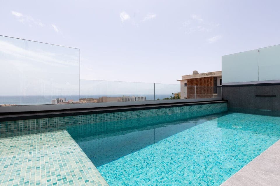 Relax, float, and take in the views—this rooftop retreat is all yours to enjoy in total privacy.