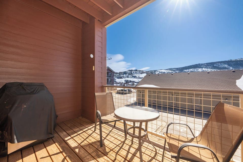 Step onto your private balcony at Ten Mile G-201 where morning coffee tastes better with stunning mountain views and crisp alpine air surrounding you.