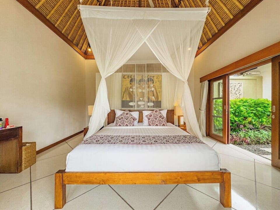 Guest Bedrooms 

There are three guest bedrooms in total:
Two are positioned side by side at the lower central area, each with its own terrace overlooking the garden and pool.
The third guest bedroom is located at the upper right corner, fea