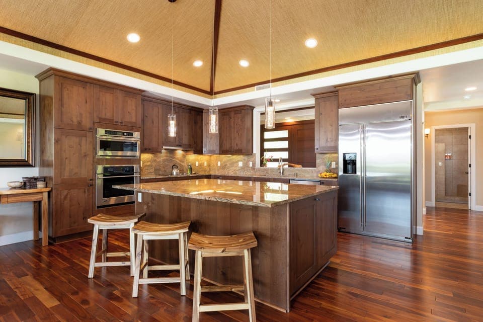 Gourmet kitchen stocked with a great assortment of spices, oils and cookware essentials