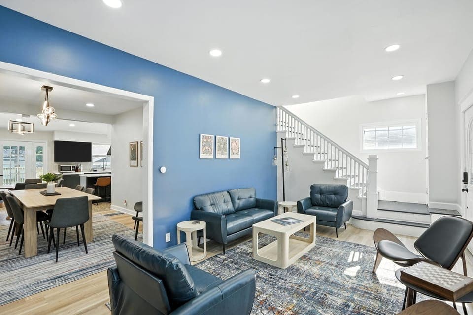 Open-concept living and dining with stylish flow, comfy seating, and a peek into the modern kitchen—perfect for hosting and hanging out!