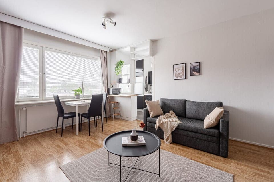 The comfy living room is perfect for relaxing after a long day of exploring the city.