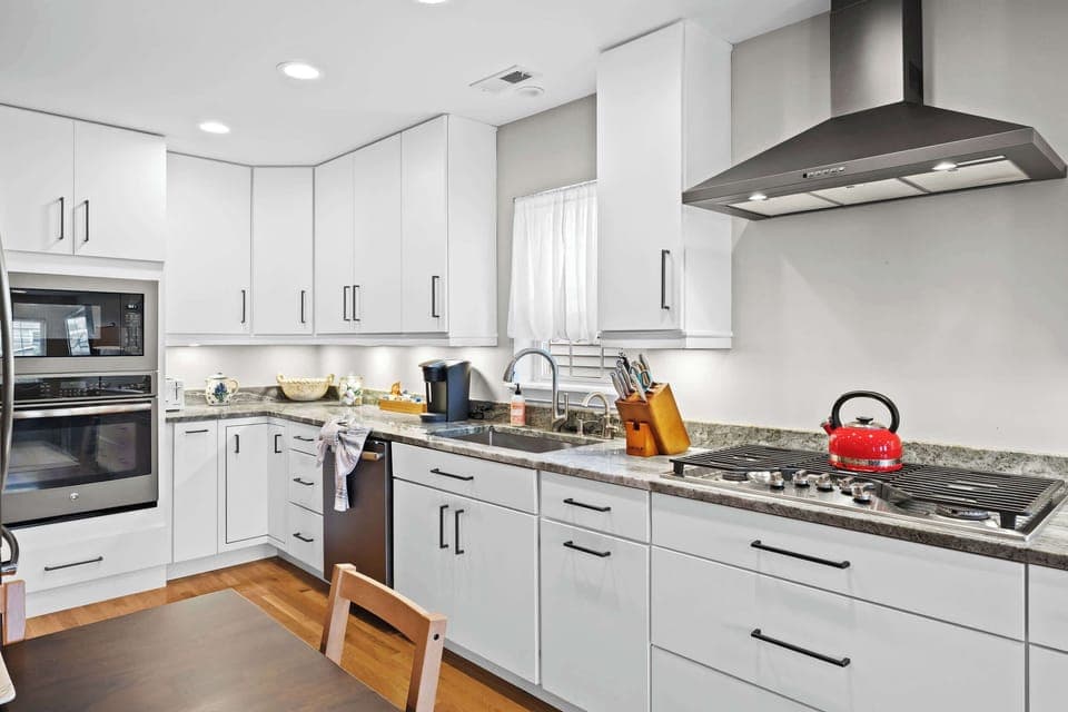 Kitchen: Contemporary amenities and ample counter space make cooking a joy in this kitchen.