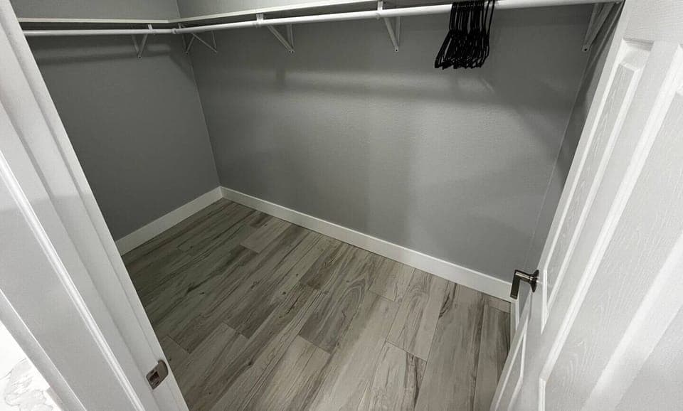 Walk-in closet inside Bathroom 1.