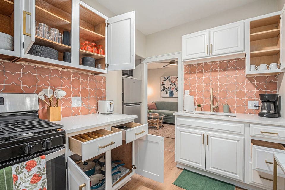 Fully stocked kitchen with cookware and all the essentials in Apt 1M