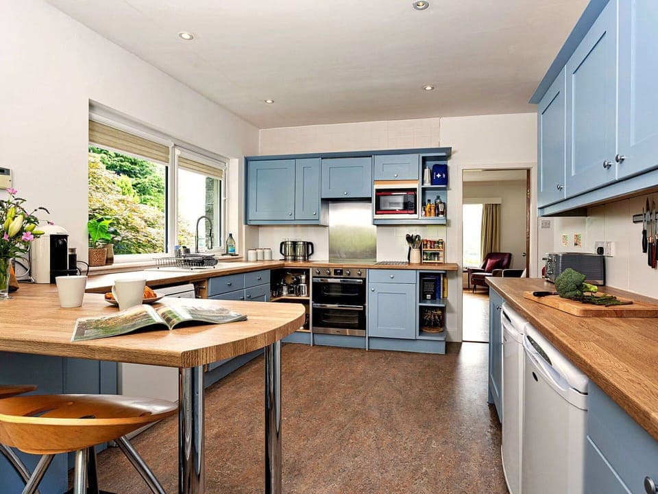 Furniture, Kitchen, Countertop, Kitchen Appliance, Interior Design, Flooring, Major Appliance, Cabinetry, Wood, Ceiling