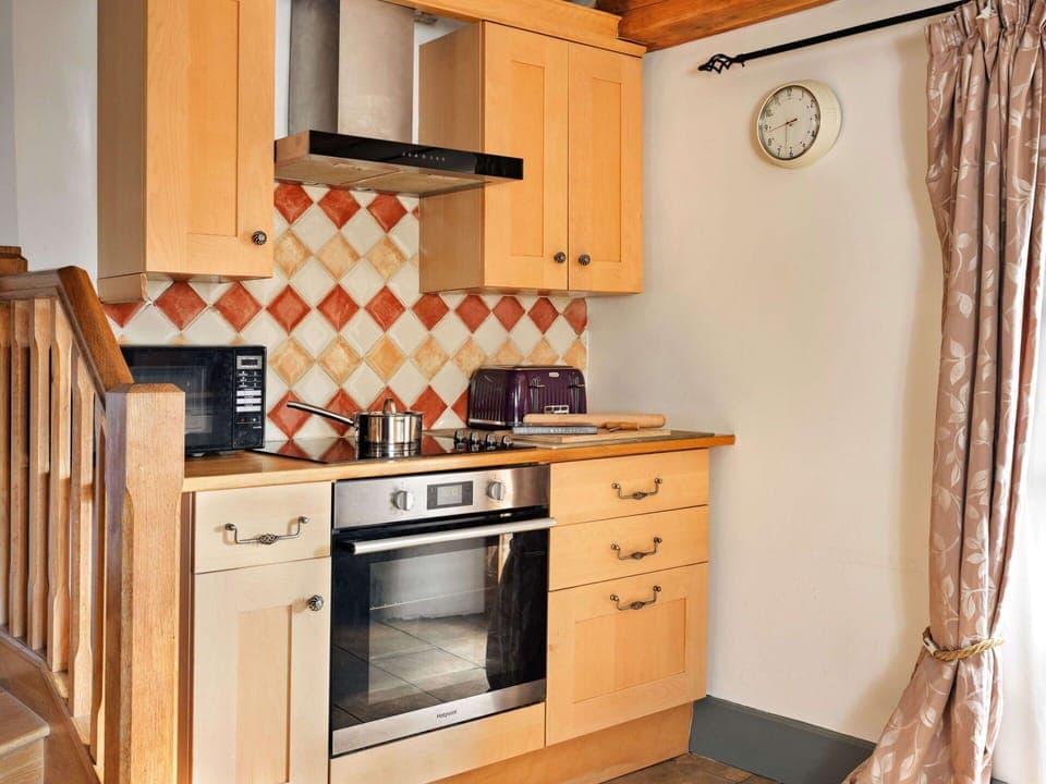 Kitchen, Furniture, Cabinetry, Countertop, Interior Design, Flooring, Kitchen Appliance, Wood, Major Appliance, Floor