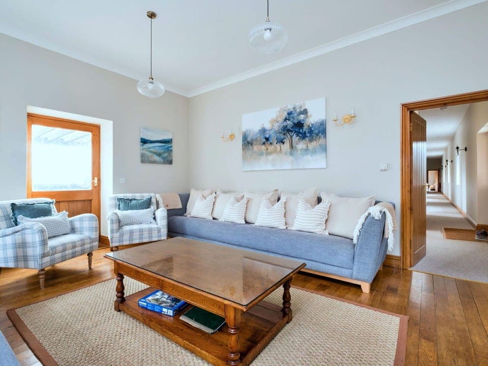 Furniture, Interior Design, Couch, Flooring, Floor, Wood, Ceiling, Room, Living Room, Picture Frame