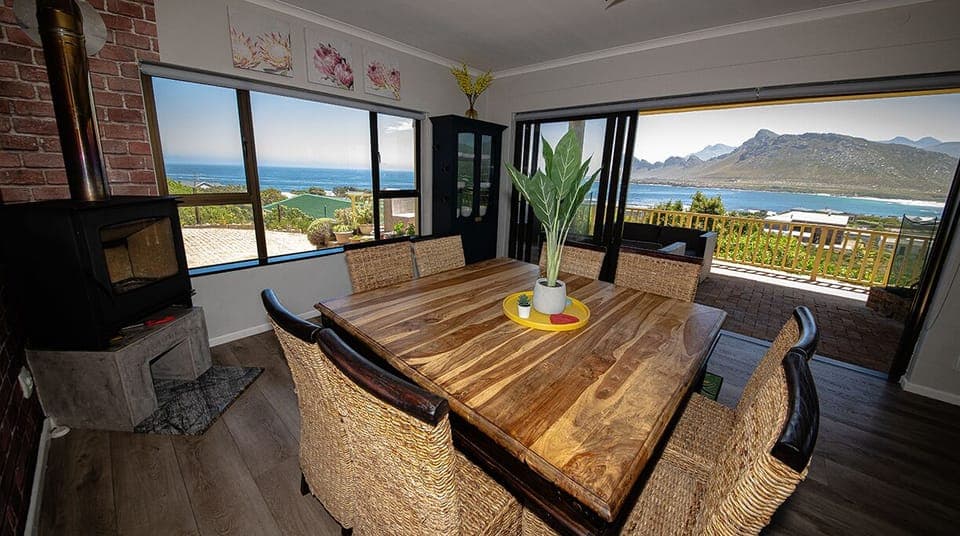 Dining Room with fireplace leading out to the terrace 