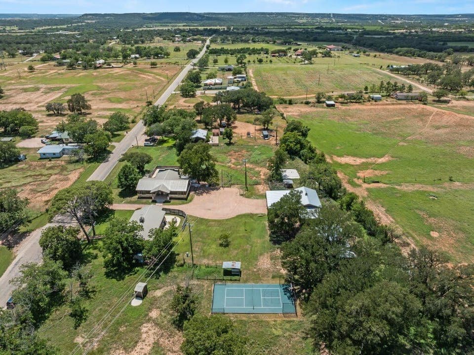 Take in the big picture with this stunning aerial view—your home away from home nestled in a peaceful, scenic neighborhood that’s just as charming from above as it is on the ground.