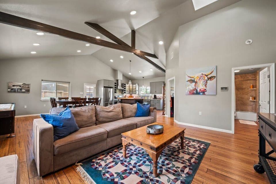 Our open floor concept living area invites you to relax, connect, and unwind — with seamless flow between the kitchen, dining, and lounging spaces.

