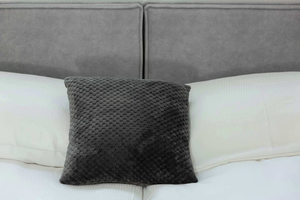 Soft pillows on the bed. 