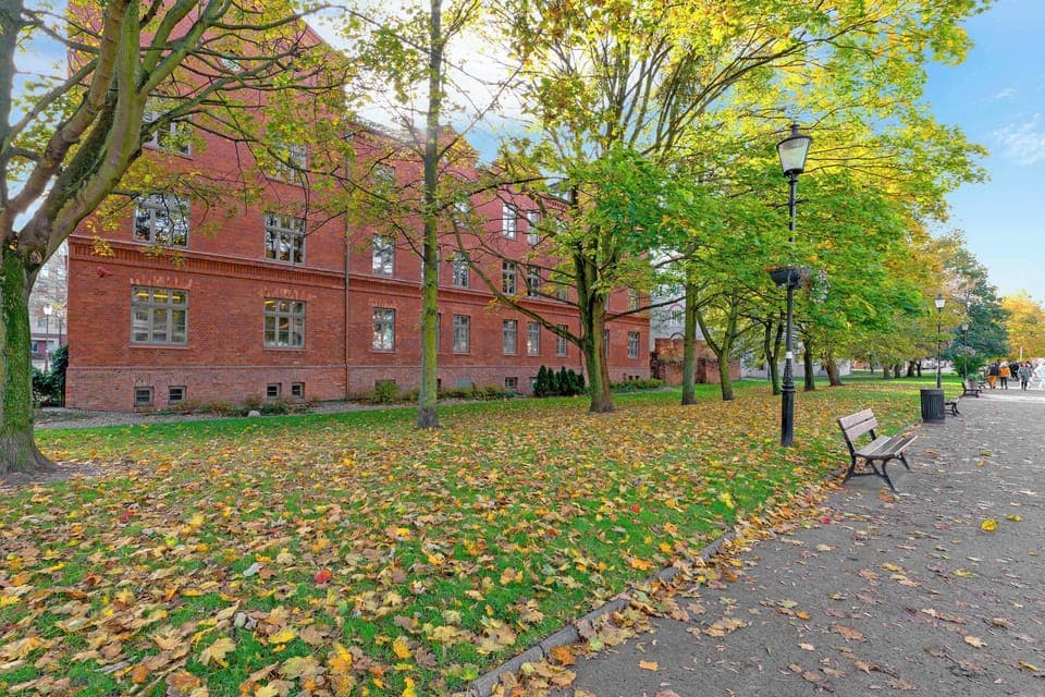 A charming red brick building of the facility.