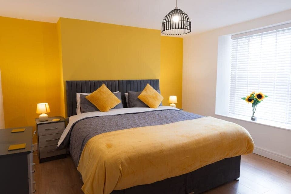 Bright bedroom with king-size bed and natural light